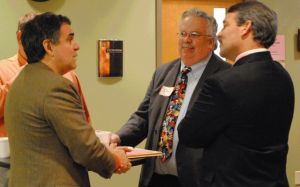 Attendees at the Pink Slip party networking.